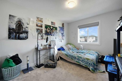 20 Amblefield Avenue Nw, Calgary, AB - Indoor Photo Showing Bedroom