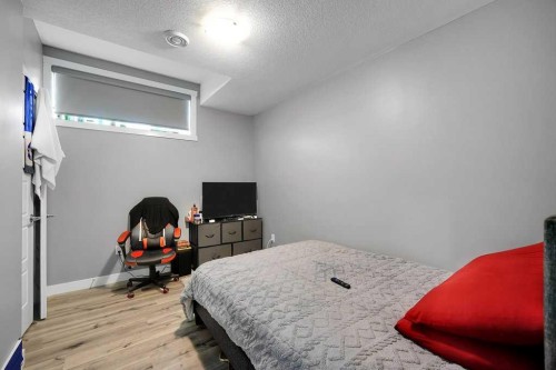 20 Amblefield Avenue Nw, Calgary, AB - Indoor Photo Showing Bedroom