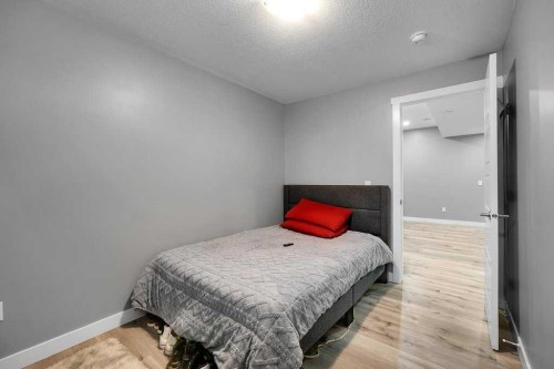 20 Amblefield Avenue Nw, Calgary, AB - Indoor Photo Showing Bedroom