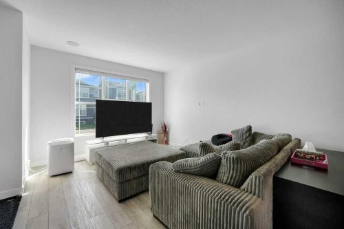 20 Amblefield Avenue Nw, Calgary, AB - Indoor Photo Showing Living Room