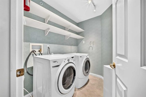 1109-1109 Hawksbrow Point Nw, Calgary, AB - Indoor Photo Showing Laundry Room