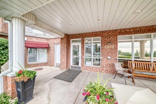 1109-1109 Hawksbrow Point Nw, Calgary, AB - Outdoor With Deck Patio Veranda With Exterior