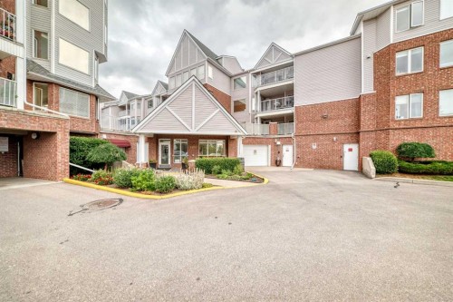 1109-1109 Hawksbrow Point Nw, Calgary, AB - Outdoor With Facade