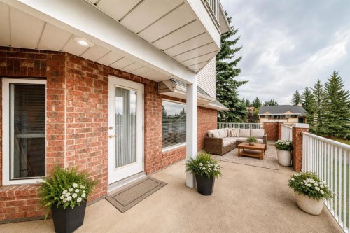 1109-1109 Hawksbrow Point Nw, Calgary, AB - Outdoor With Exterior