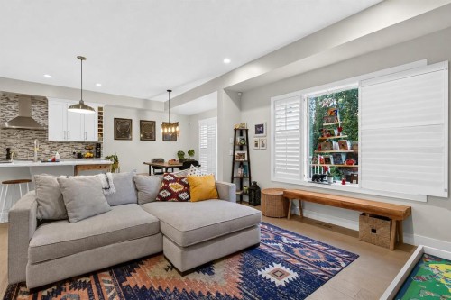 725 New Brighton Drive Se, Calgary, AB - Indoor Photo Showing Living Room