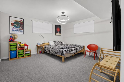 725 New Brighton Drive Se, Calgary, AB - Indoor Photo Showing Bedroom
