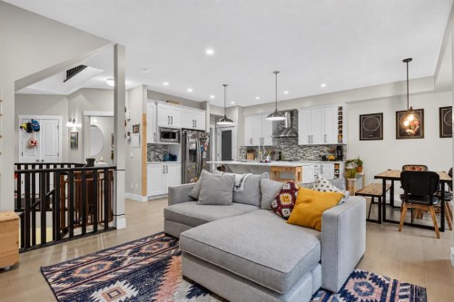 725 New Brighton Drive Se, Calgary, AB - Indoor Photo Showing Living Room