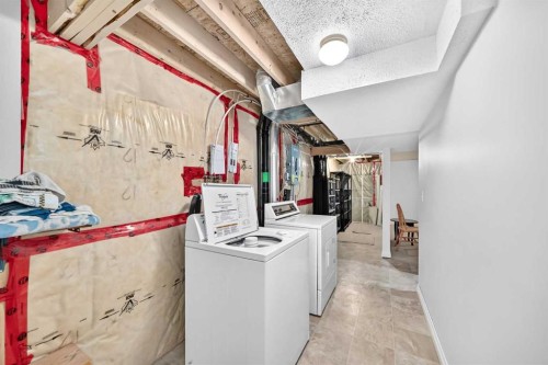 20 Everstone Place Sw, Calgary, AB - Indoor Photo Showing Laundry Room
