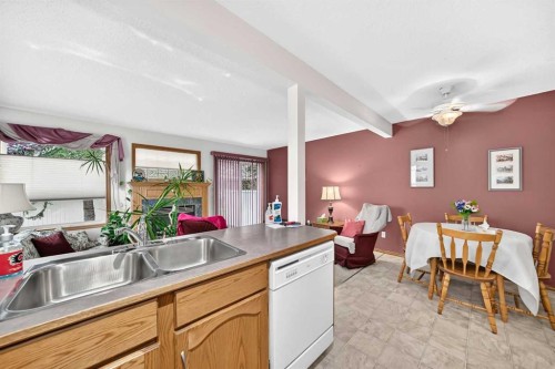 20 Everstone Place Sw, Calgary, AB - Indoor Photo Showing Kitchen With Double Sink