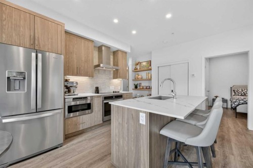 219-12 Mahogany Path Se, Calgary, AB - Indoor Photo Showing Kitchen With Stainless Steel Kitchen With Upgraded Kitchen