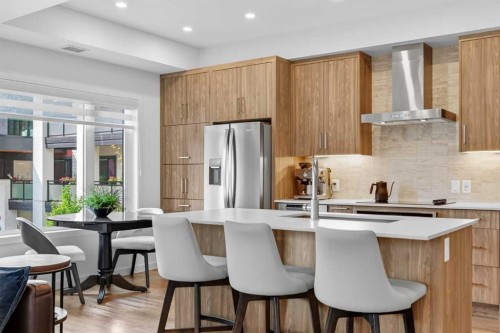 219-12 Mahogany Path Se, Calgary, AB - Indoor Photo Showing Kitchen With Stainless Steel Kitchen With Upgraded Kitchen