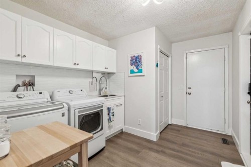 6991 Christie Briar Manor Sw, Calgary, AB - Indoor Photo Showing Laundry Room