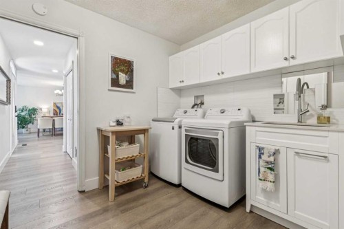 6991 Christie Briar Manor Sw, Calgary, AB - Indoor Photo Showing Laundry Room