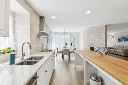 6991 Christie Briar Manor Sw, Calgary, AB - Indoor Photo Showing Kitchen With Double Sink With Upgraded Kitchen