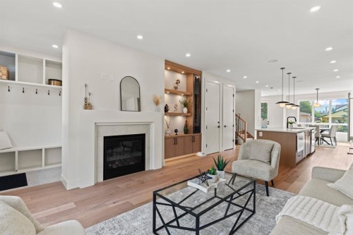 8138 47 Avenue Nw, Calgary, AB - Indoor Photo Showing Living Room With Fireplace