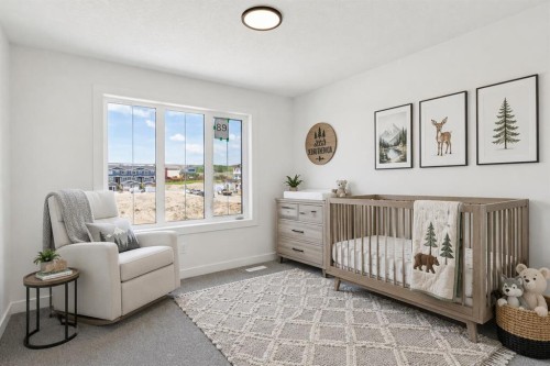 69 Heritage Park, Cochrane, AB - Indoor Photo Showing Bedroom