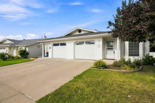 4014 Shannon Drive, Olds, AB - Outdoor With Facade