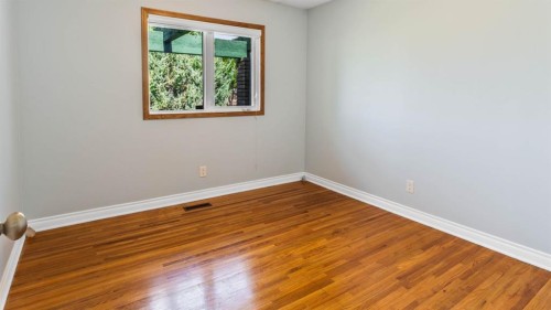 1027 Lake Sylvan Drive Se, Calgary, AB - Indoor Photo Showing Other Room