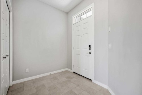 244 Sundown View, Cochrane, AB - Indoor Photo Showing Other Room