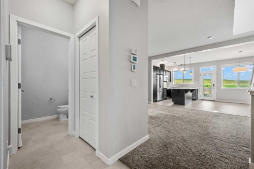 244 Sundown View, Cochrane, AB - Indoor Photo Showing Other Room
