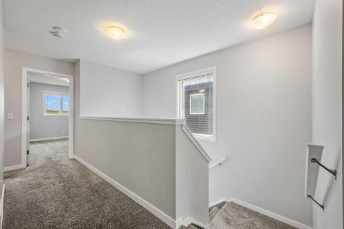 244 Sundown View, Cochrane, AB - Indoor Photo Showing Other Room