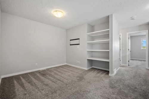 244 Sundown View, Cochrane, AB - Indoor Photo Showing Other Room