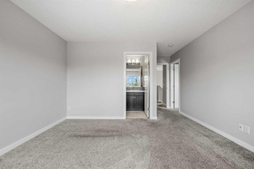 244 Sundown View, Cochrane, AB - Indoor Photo Showing Other Room