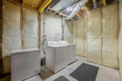 244 Sundown View, Cochrane, AB - Indoor Photo Showing Laundry Room