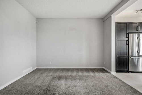 244 Sundown View, Cochrane, AB - Indoor Photo Showing Other Room