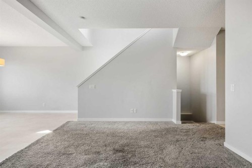 244 Sundown View, Cochrane, AB - Indoor Photo Showing Other Room