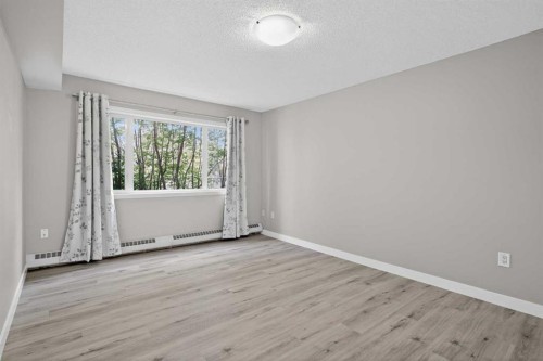 116-790 Kingsmere Crescent Sw, Calgary, AB - Indoor Photo Showing Other Room