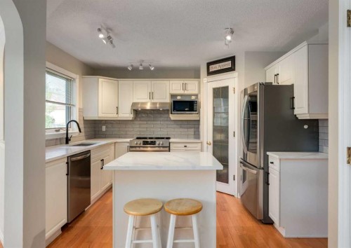 63 Arbour Lake Drive Nw, Calgary, AB - Indoor Photo Showing Kitchen With Stainless Steel Kitchen