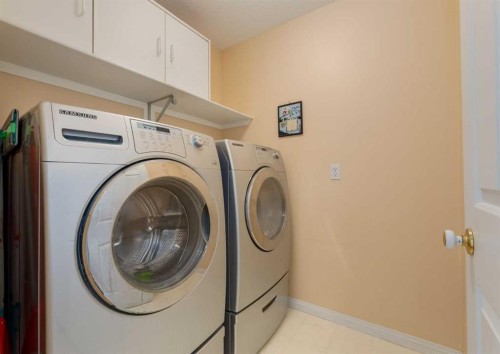 63 Arbour Lake Drive Nw, Calgary, AB - Indoor Photo Showing Laundry Room