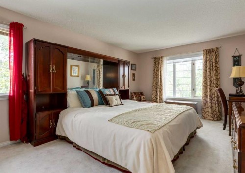 63 Arbour Lake Drive Nw, Calgary, AB - Indoor Photo Showing Bedroom