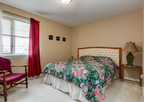 63 Arbour Lake Drive Nw, Calgary, AB - Indoor Photo Showing Bedroom