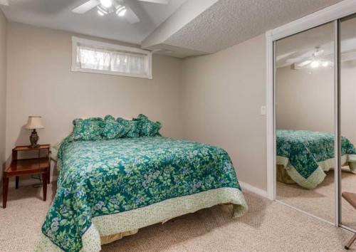 63 Arbour Lake Drive Nw, Calgary, AB - Indoor Photo Showing Bedroom