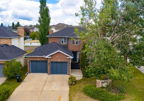 63 Arbour Lake Drive Nw, Calgary, AB - Outdoor With Facade