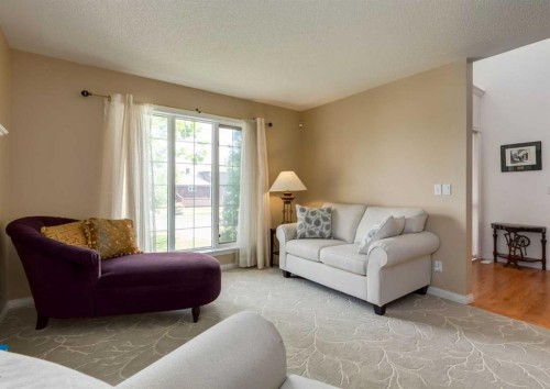 63 Arbour Lake Drive Nw, Calgary, AB - Indoor Photo Showing Living Room