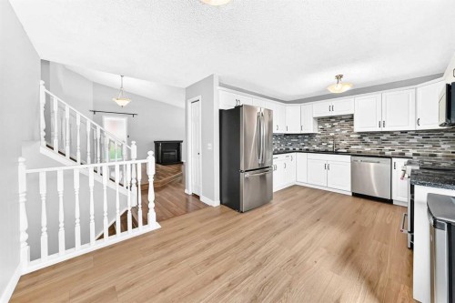 8 Hawkfield Crescent Nw, Calgary, AB - Indoor Photo Showing Kitchen With Upgraded Kitchen