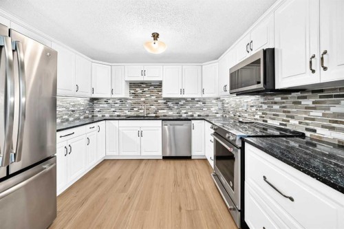 8 Hawkfield Crescent Nw, Calgary, AB - Indoor Photo Showing Kitchen With Upgraded Kitchen