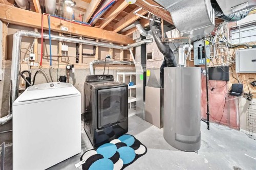 8 Hawkfield Crescent Nw, Calgary, AB - Indoor Photo Showing Laundry Room