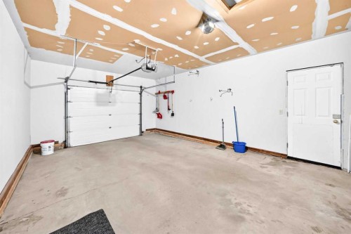 8 Hawkfield Crescent Nw, Calgary, AB - Indoor Photo Showing Garage