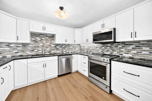 8 Hawkfield Crescent Nw, Calgary, AB - Indoor Photo Showing Kitchen With Upgraded Kitchen