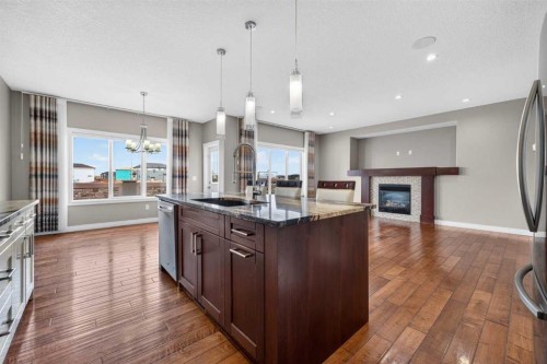 148 Evansborough Way Nw, Calgary, AB - Indoor Photo Showing Kitchen With Upgraded Kitchen