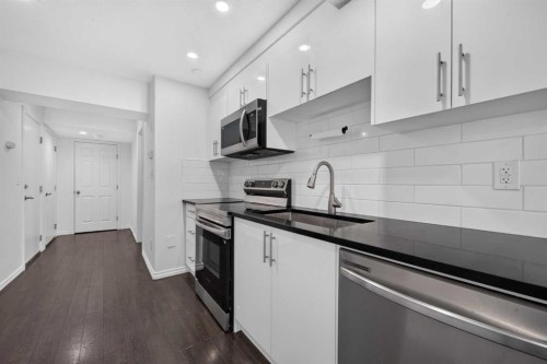 148 Evansborough Way Nw, Calgary, AB - Indoor Photo Showing Kitchen With Upgraded Kitchen