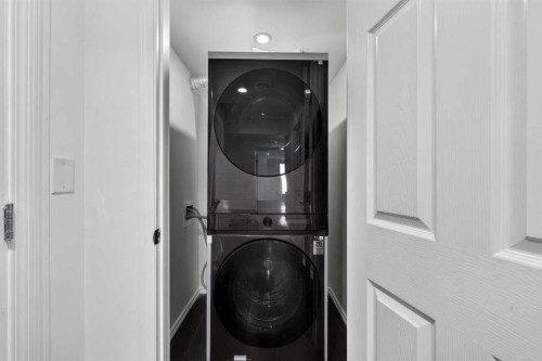 148 Evansborough Way Nw, Calgary, AB - Indoor Photo Showing Laundry Room