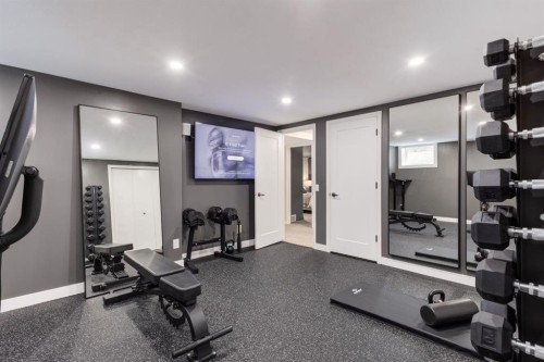 191 Canterville Drive Sw, Calgary, AB - Indoor Photo Showing Gym Room