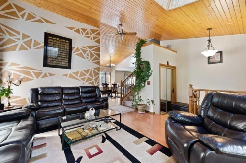 48 Castleglen Court Ne, Calgary, AB - Indoor Photo Showing Living Room