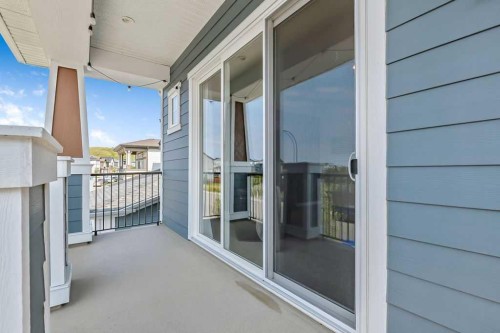 100 Cranbrook Gardens West, Calgary, AB - Outdoor With Balcony With Deck Patio Veranda With Exterior