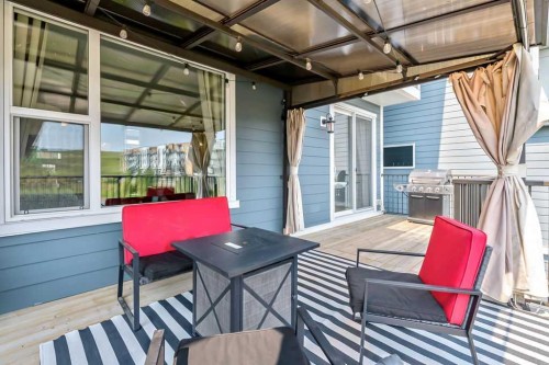 100 Cranbrook Gardens West, Calgary, AB - Outdoor With Deck Patio Veranda With Exterior